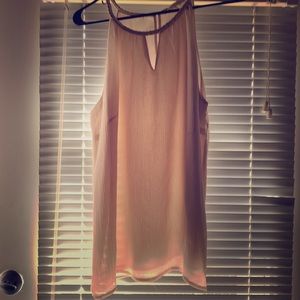 Cute sleeveless top. Size L.